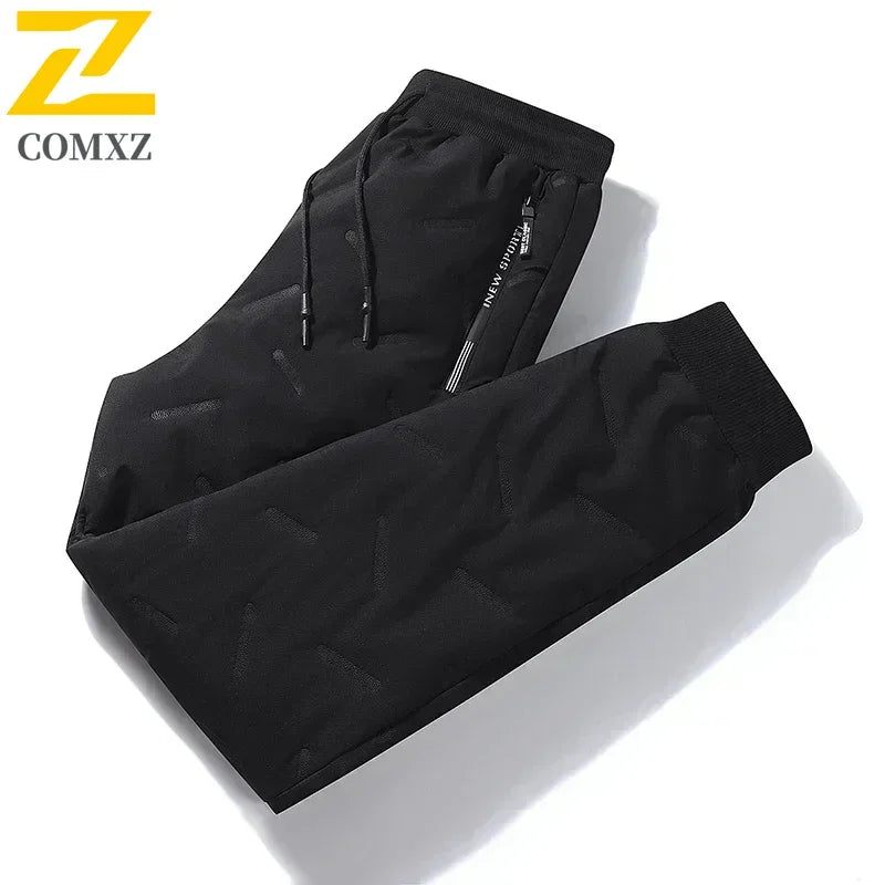 Stay Warm and Stylish: Men's Winter Down Cotton Jogger Pants with Waterproof Zipper Pockets